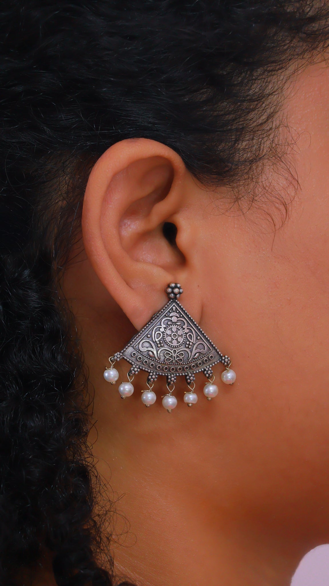 Aarvi Oxidised Pearl Earrings | Pearls | Silver Replica | Boho | Floral Earrings worn by a woman