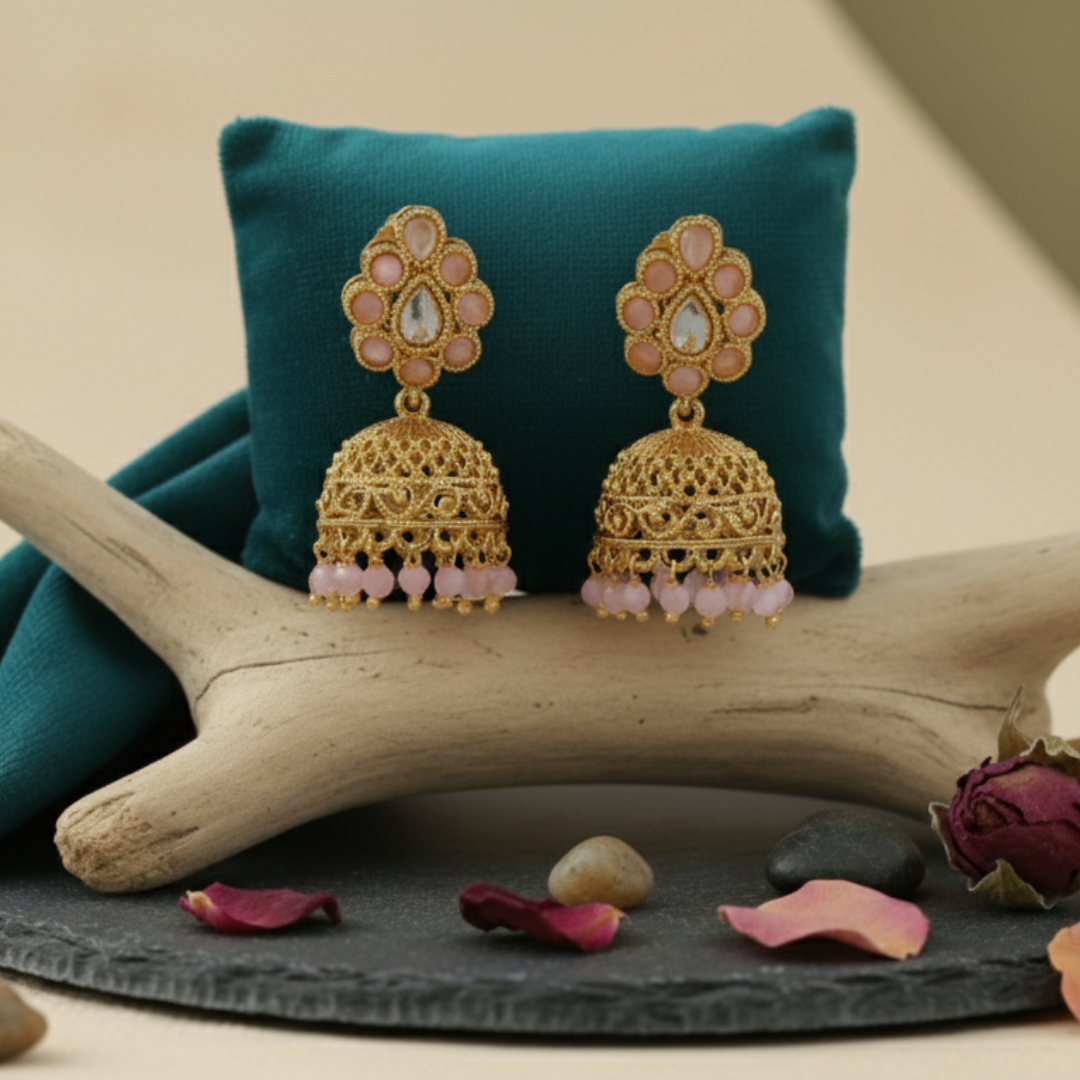 Baby Pink High Quality Golden Polish Jhumkas on an aesthetic backdrop