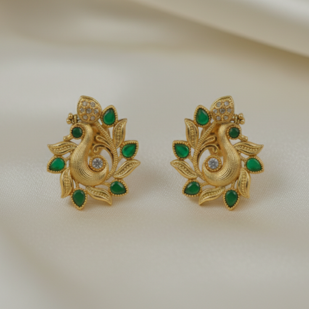 Peacock earrings with green gemstones