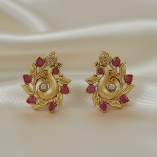Peacock earrings with red gemstones